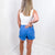 Judy Blue Celeste Mid Rise Shield Pocket Cutoff Shorts in Sky Blue - Boujee Boutique 