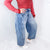 Cello Distressed Mid Rise Barrel Leg Jeans With Side Panels In a Medium Wash - Boujee Boutique 