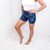 Judy Blue Cassie Distressed Cut Off Mid Length Shorts - Boujee Boutique 
